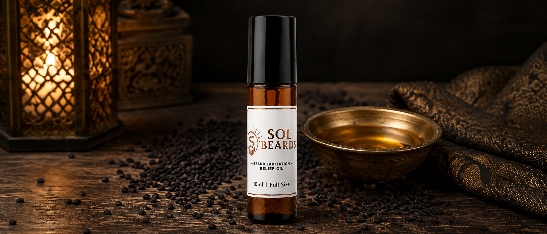 Roll-on bottle of 'The Soul of Beards' on a wooden surface with candles and a bowl in the background.